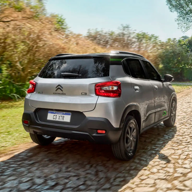 Compact hatchback car, professional photography, city background